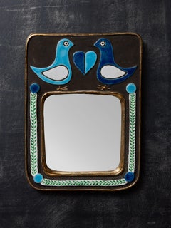 Miroir bleu avec décor d'oiseaux de Mithe Espelt