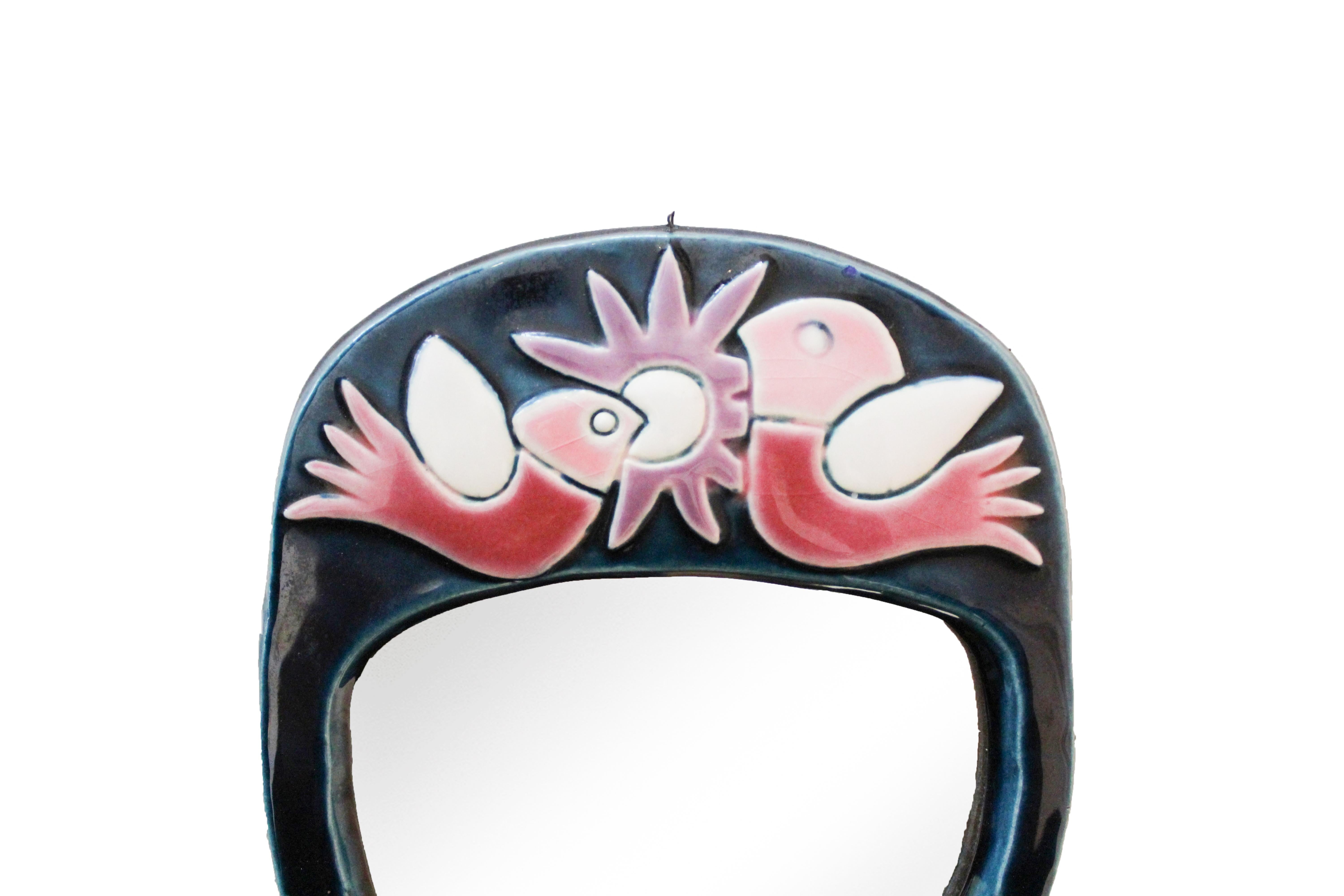 Mithé Espelt ceramic hand mirror, circa 1960, France.
Glazed embossed earthenware.
Iconic mirror decorated with birds.
Original felt backing.
Circa 1960, France.
Very good condition.
The life of Mithé Espelt is a real saga. Born in 1923 in
