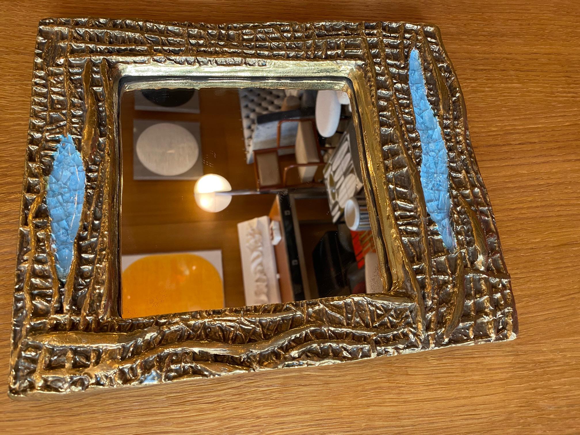 Ceramic mirror attributed to Mithé Espelt, France, 1960s.