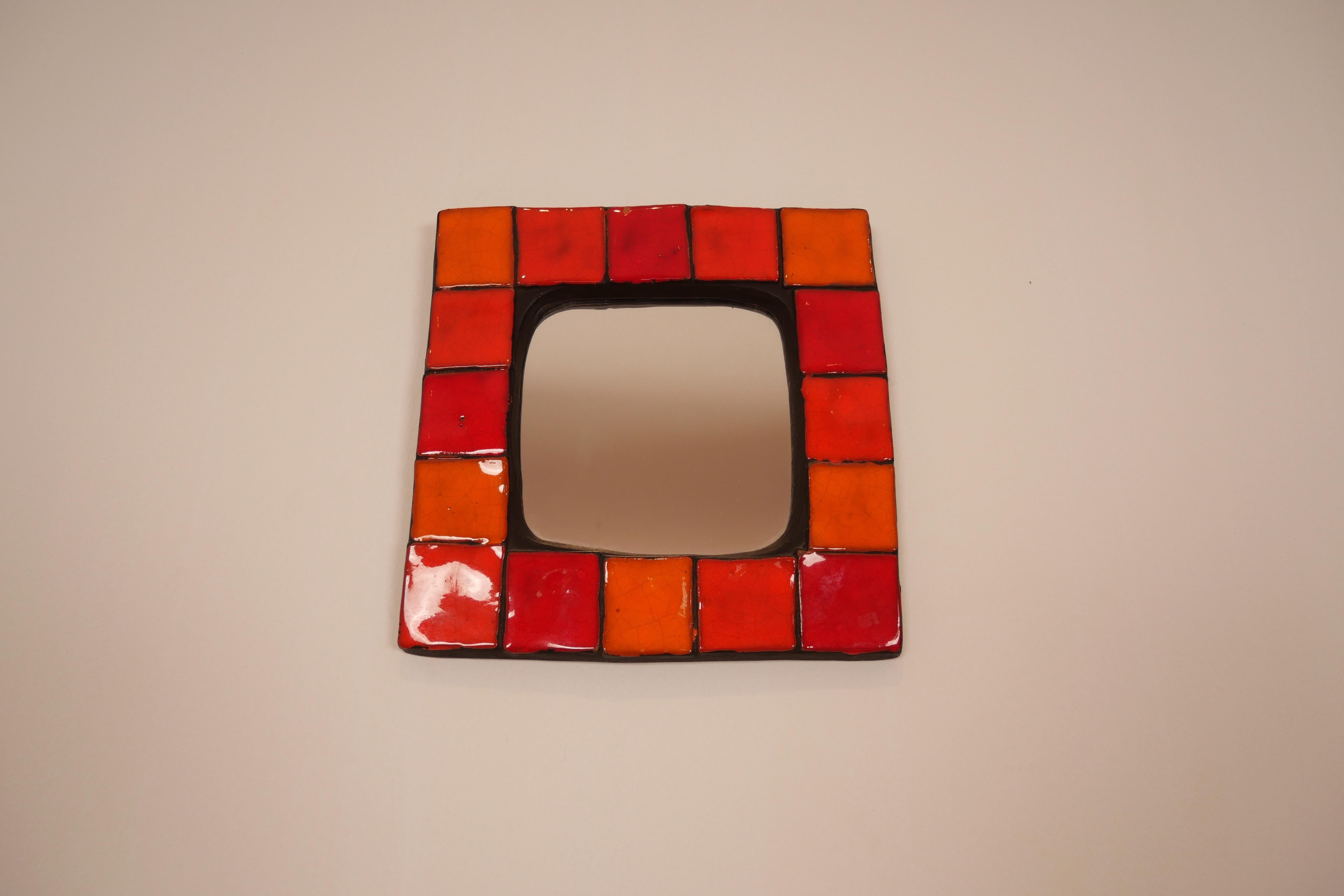 Mid-Century Modern Mithe Espelt Ceramic Mirror in Various Shades of Red and Orange 60's For Sale
