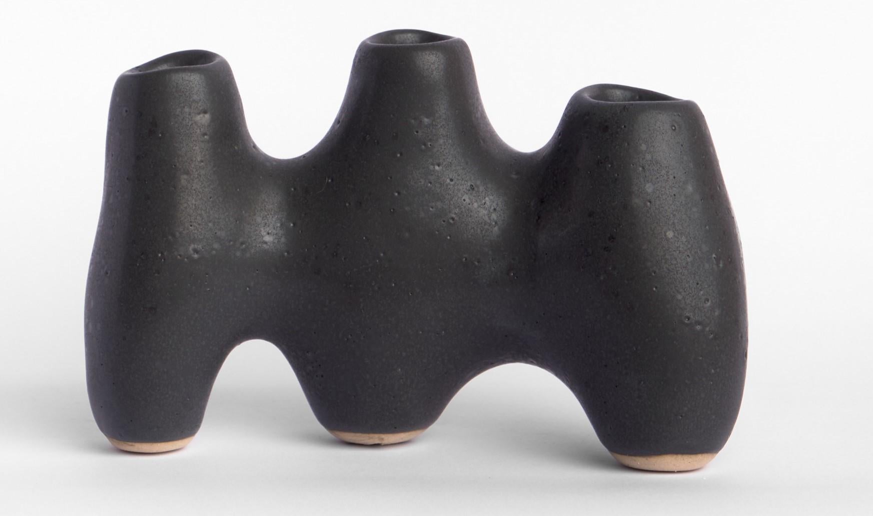 Mitosis candle holder by Camila Apaez
One of a Kind
Materials: Stoneware
Dimensions: W 10 x D 7 x 7 H cm

Ila Ceramica emerged from a process of inner inquiry where ceramics became a space for presence, silence, touch and patience. Camila