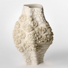 Mitotic Surface, a white porcelain sculptural vessel by Ionela Bellato