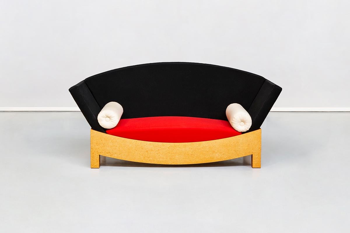 Mitzi Sofa, Hans Hollein for Poltronova, 1981
Wooden structured sofa, padded with polyurethane foam, fabric covered. Basement veneered in blonde briar-root.
The uniqueness of the object is the great mix of colors and geometric lines.