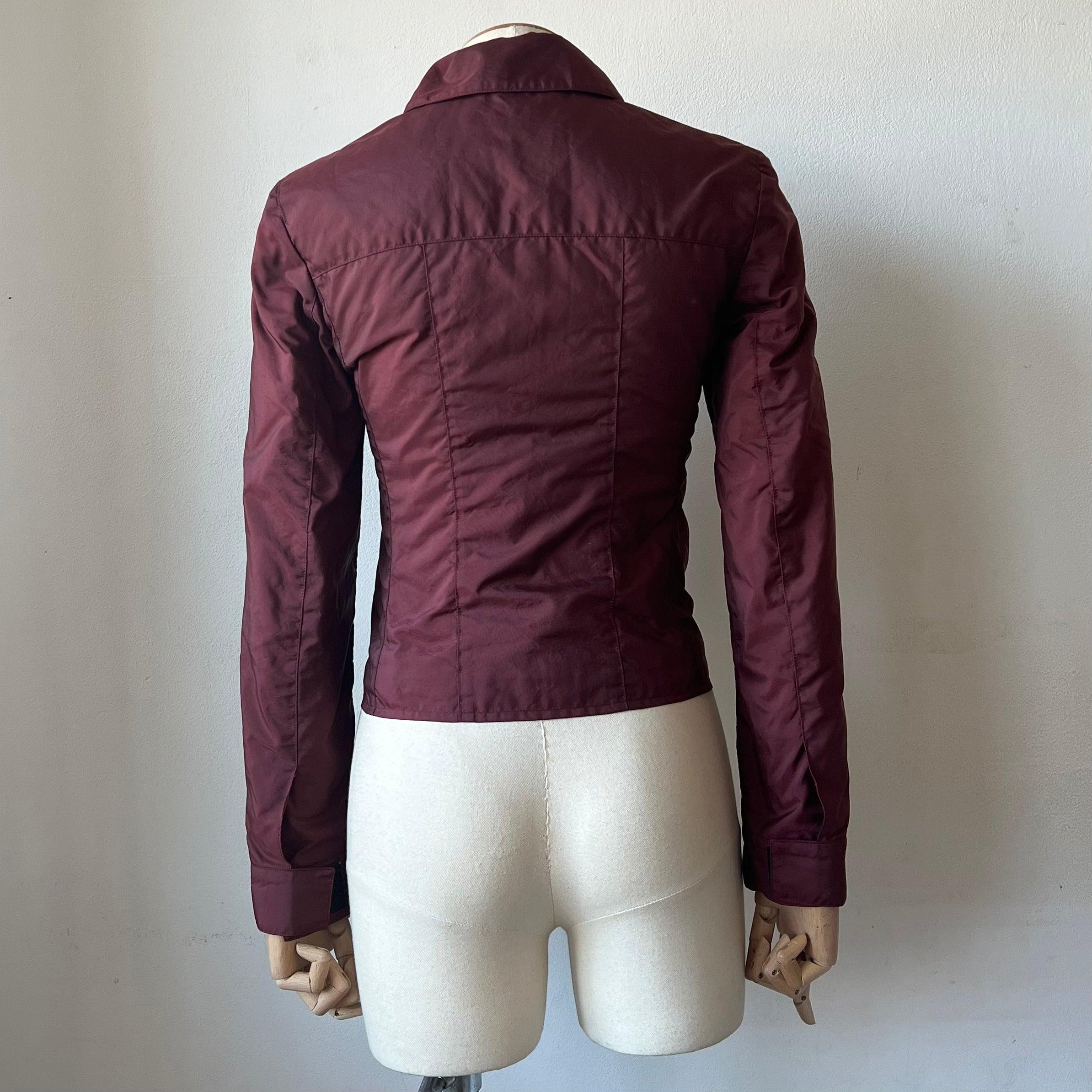 90s Miu Miu Jacket made of high quality nylon. Two utility styled pockets are visible on the front of the jacket. The jacket sits tight to the body. 


Size: Italian 38  (circa s/xs)
Condtion: 9/10 (overal very good preloved condition, with no to