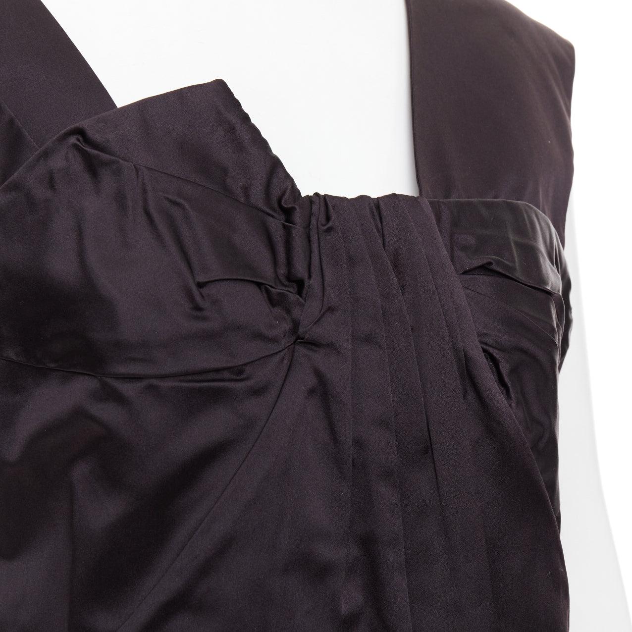 MIU MIU 2009 black silk satin bow top pleated mini dress IT44 L
Reference: CC/A00494
Brand: Miu Miu
Designer: Miuccia Prada
Collection: 2009
Material: Silk
Color: Black
Pattern: Solid
Closure: Zip
Extra Details: Side zip.
Made in: