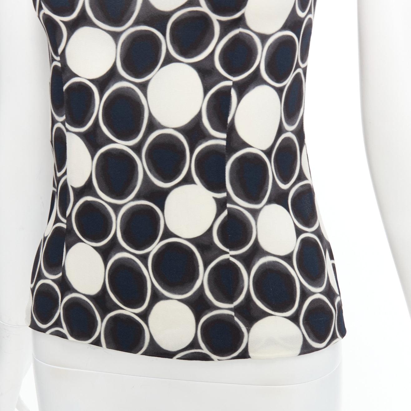 MIU MIU 2012 black white blue circle print sleeveless tank top IT36 XXS
Reference: LNKO/A02408
Brand: Miu Miu
Designer: Miuccia Prada
Collection: 2012
Material: Viscose, Blend
Color: Black, White
Pattern: Abstract
Closure: Zip
Extra Details: Back