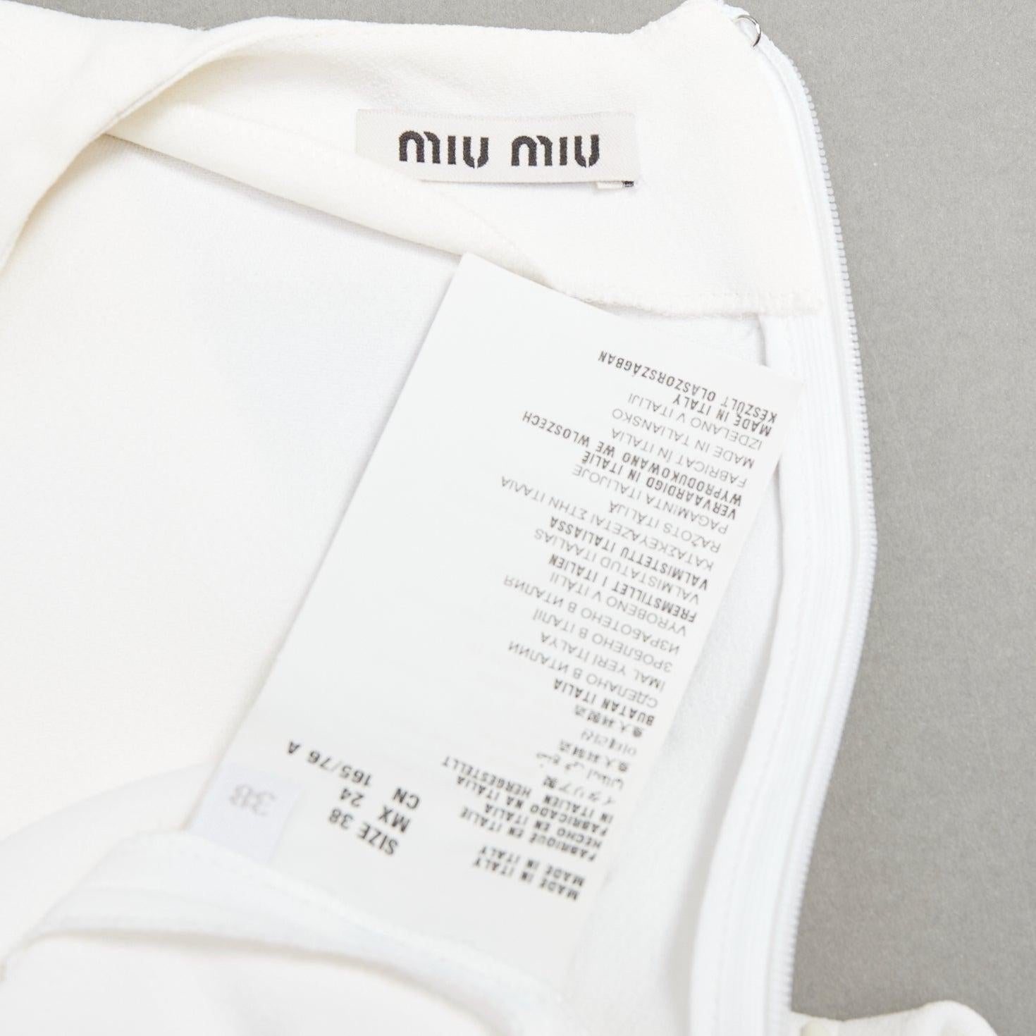 MIU 2013 - Haut à demi manches péplum en acétate crème IT38 XS en vente 3