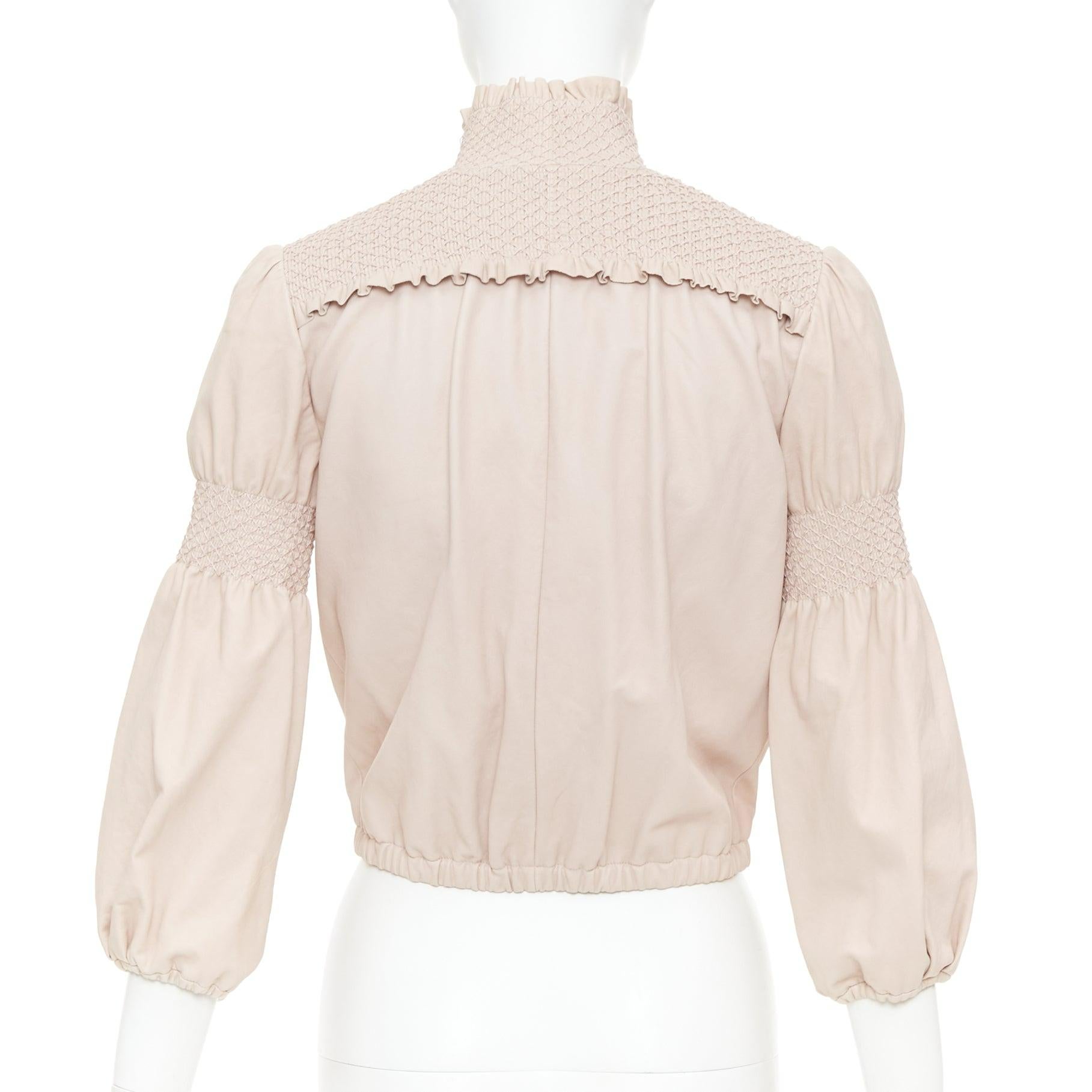 MIU MIU 2019 babyrosa gesmokte Lammfelllederjacke mit Rüschen IT40 S im Angebot 1