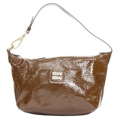 MIU MIU 2024 brown Naplak patent leather gold logo mini pouch bag