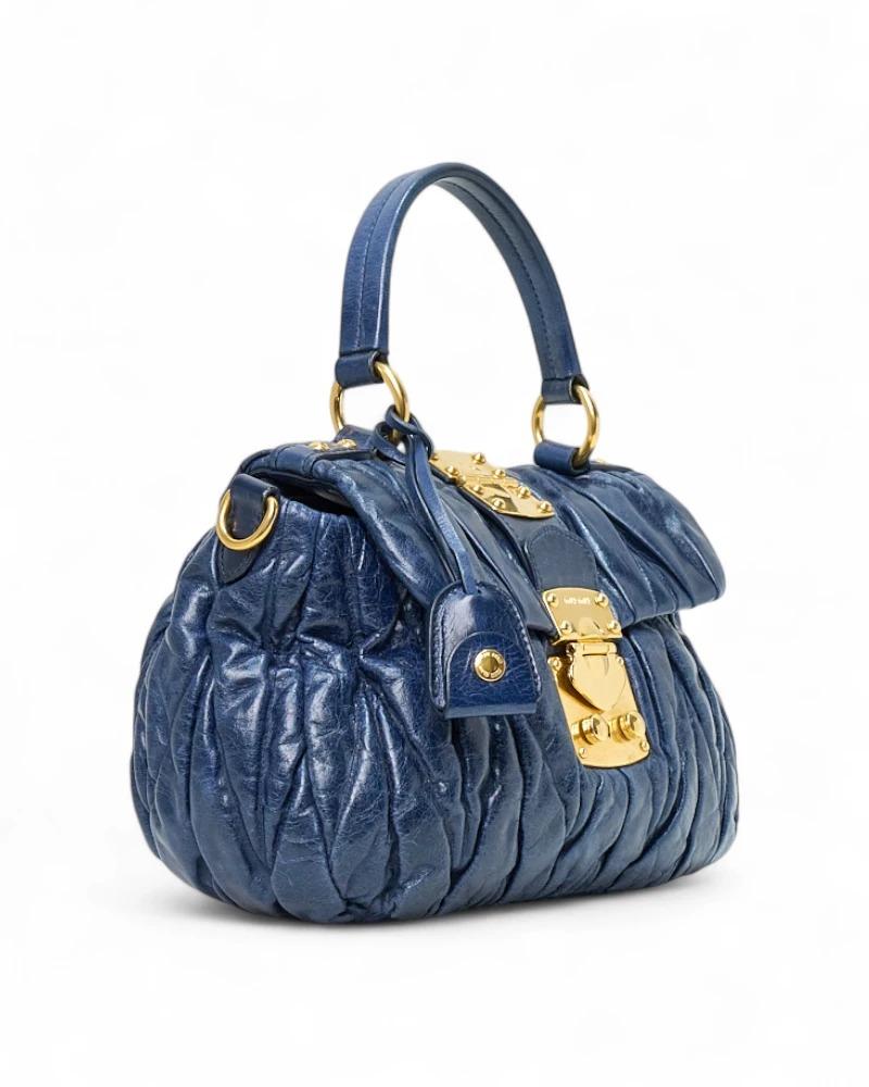 Miu Miu Bauletto Pequeño Groffato Azul Purple en venta