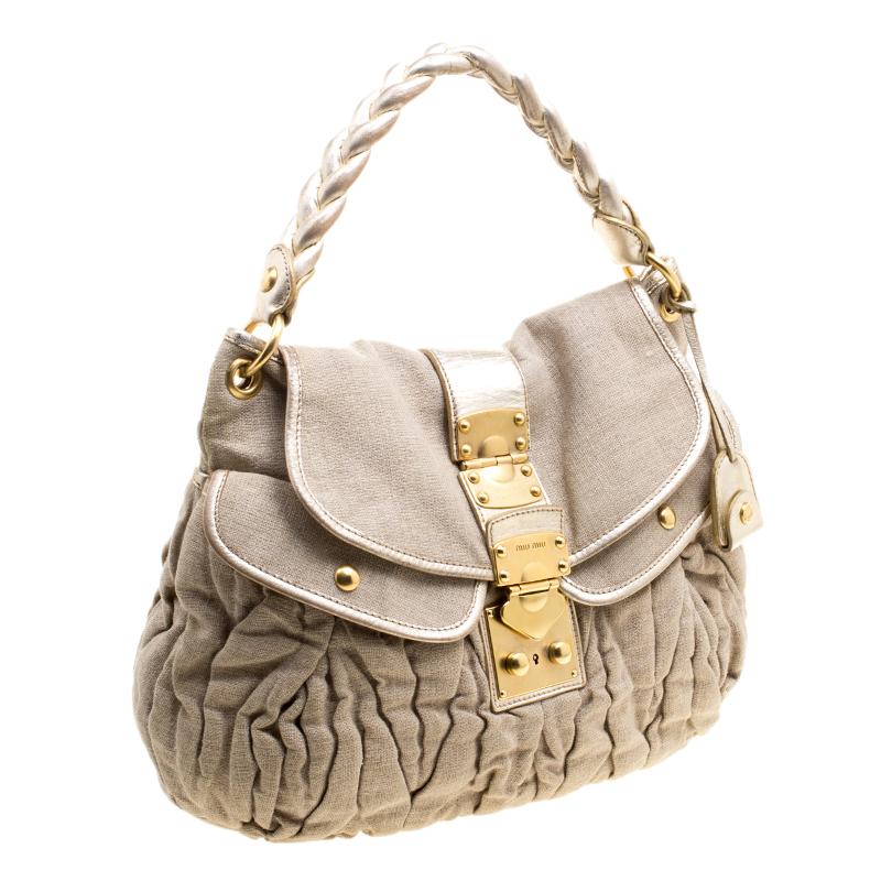 Miu Beige Segeltuch-Koffer Hobo Damen