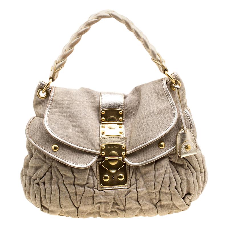 Miu Beige Segeltuch-Koffer Hobo