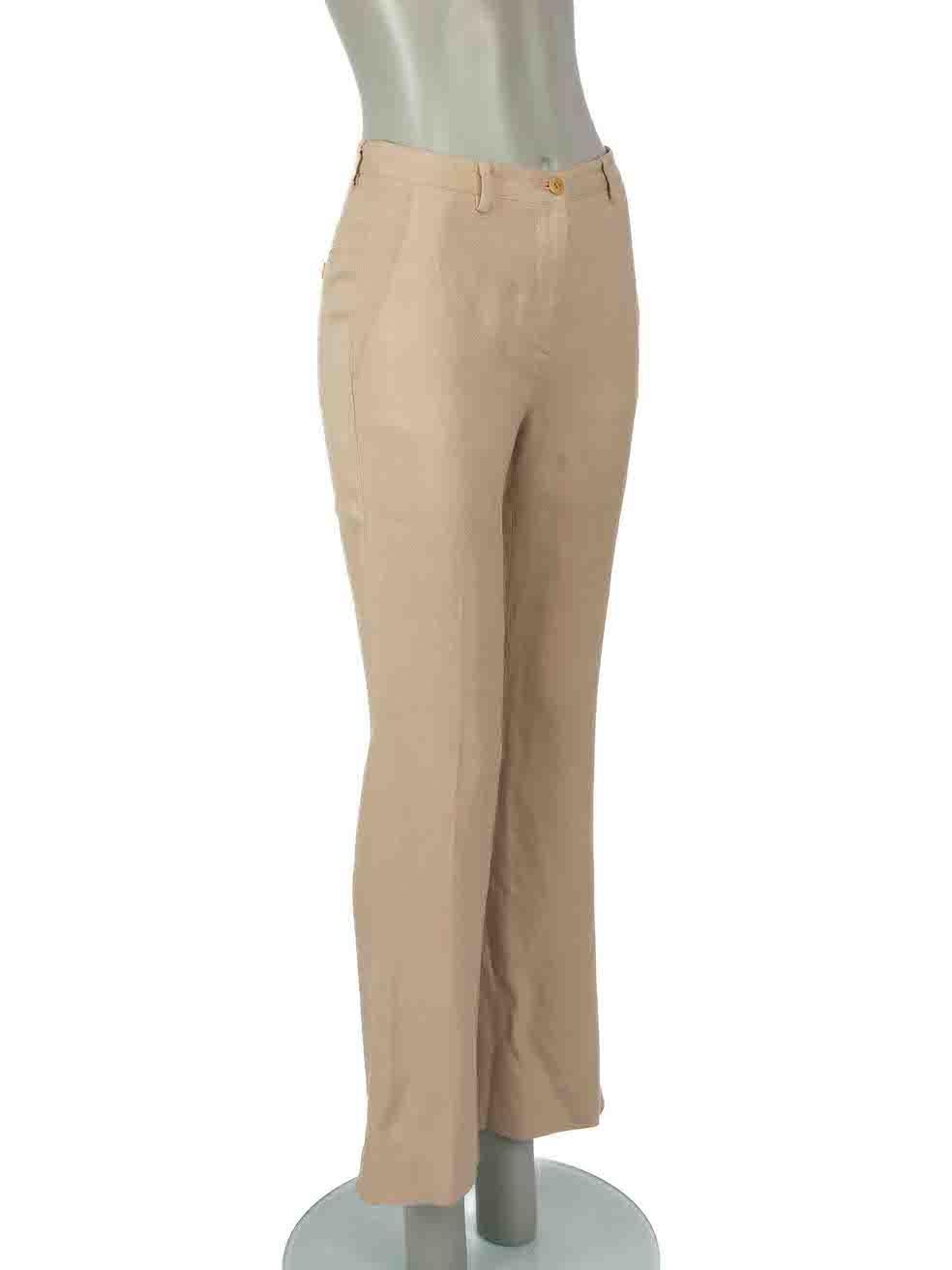 CONDITION is Very good. Minimal wear to trousers is evident. Minimal discolouration to rear right hip and a scuff mark to the rear left hemline on this used Miu Miu designer resale item.

Details
Beige
Viscose
Straight leg trousers
Mid rise
Front