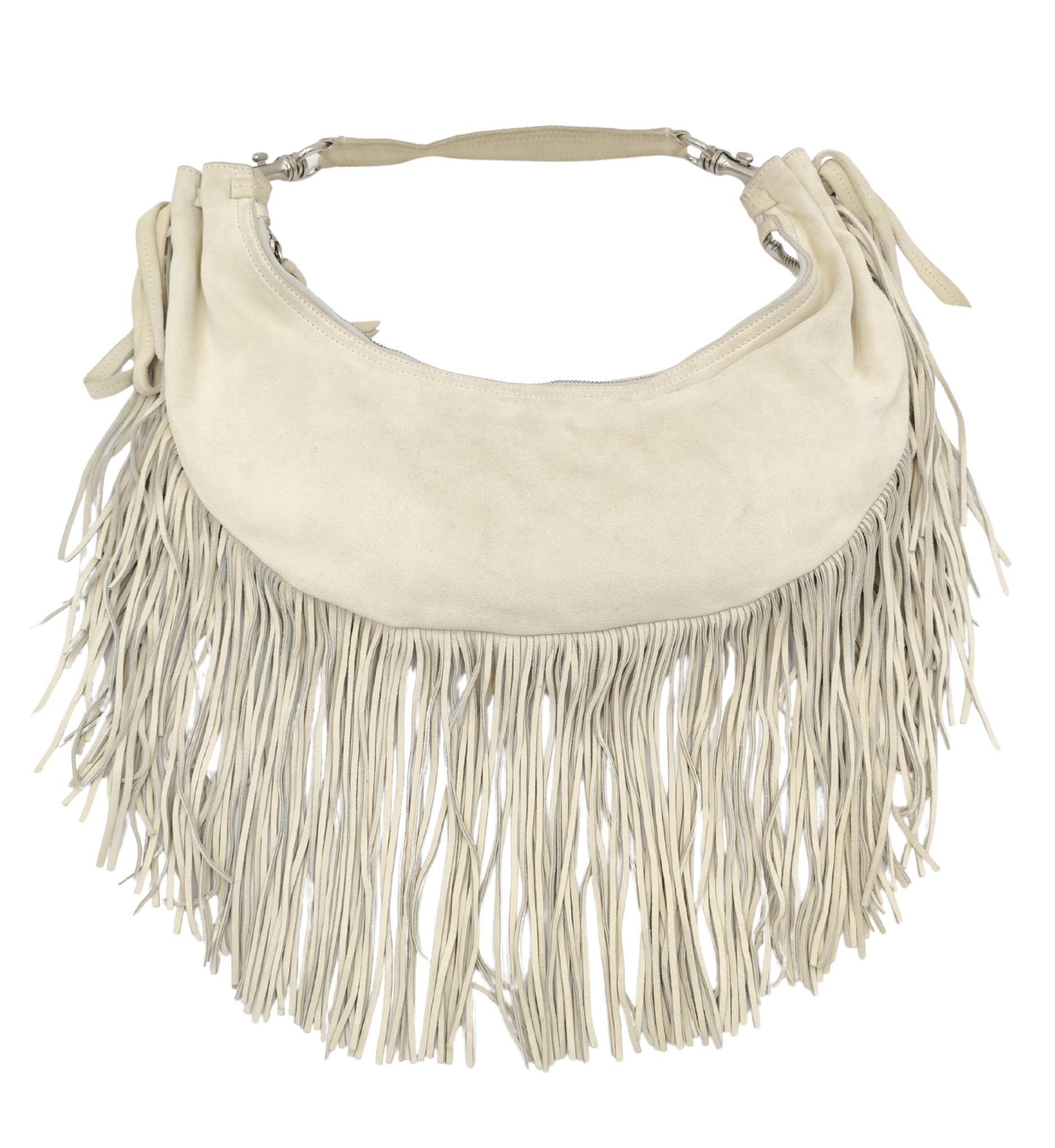 Miu Miu half moon fringe bag
Beige suede
Embossed logo

Measurements: 
40x15x2 cm
drop 20 cm

15.5x6x1 in
drop 8 in

Very good condition
Some darkening
Minor signs of use