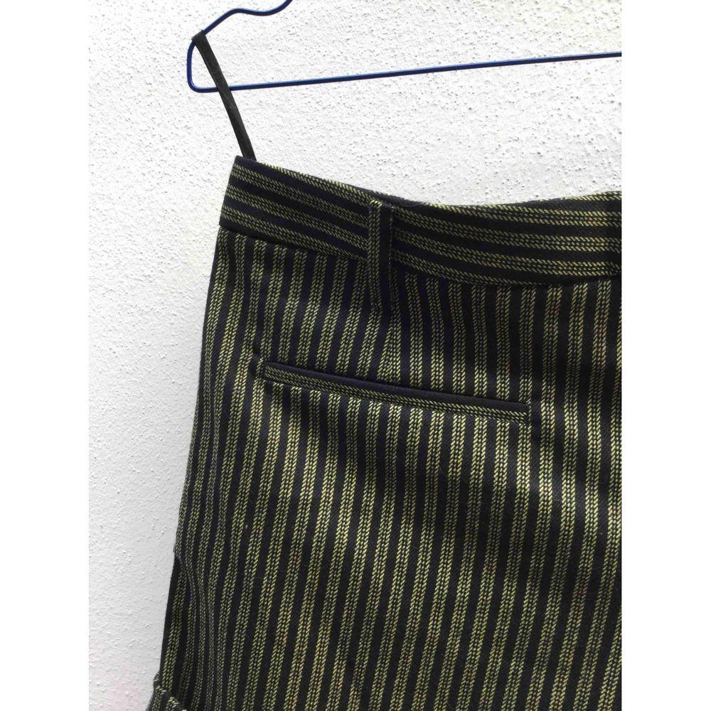 black and yellow striped skirt