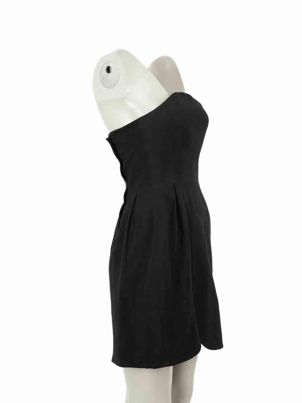CONDITION is Very good. Minimal wear to dress is evident. Minimal wear to the front and back with very light marks on this used Miu Miu designer resale item.
 
Details
Black
Synthetic
Dress
Strapless
Mini
Asymmetric sweetheart neckline 
Back zip and
