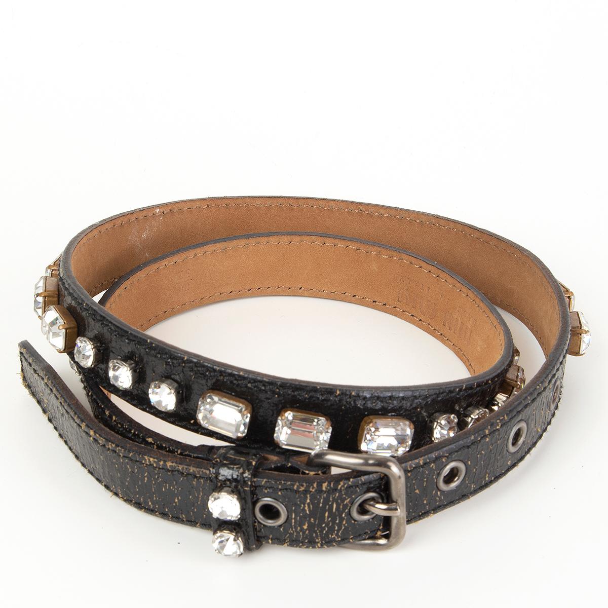 Miu Miu crystal embellished black cracked leather belt. Has been worn and is in excellent condition. 

Tag Size 80
Width 2cm (0.8in)
Fits 74cm (28.9in) to 84cm (32.8in)
Length 96cm (37.4in)
Buckle Size Height 3cm (1.2in)
Buckle Size Width 2.5cm