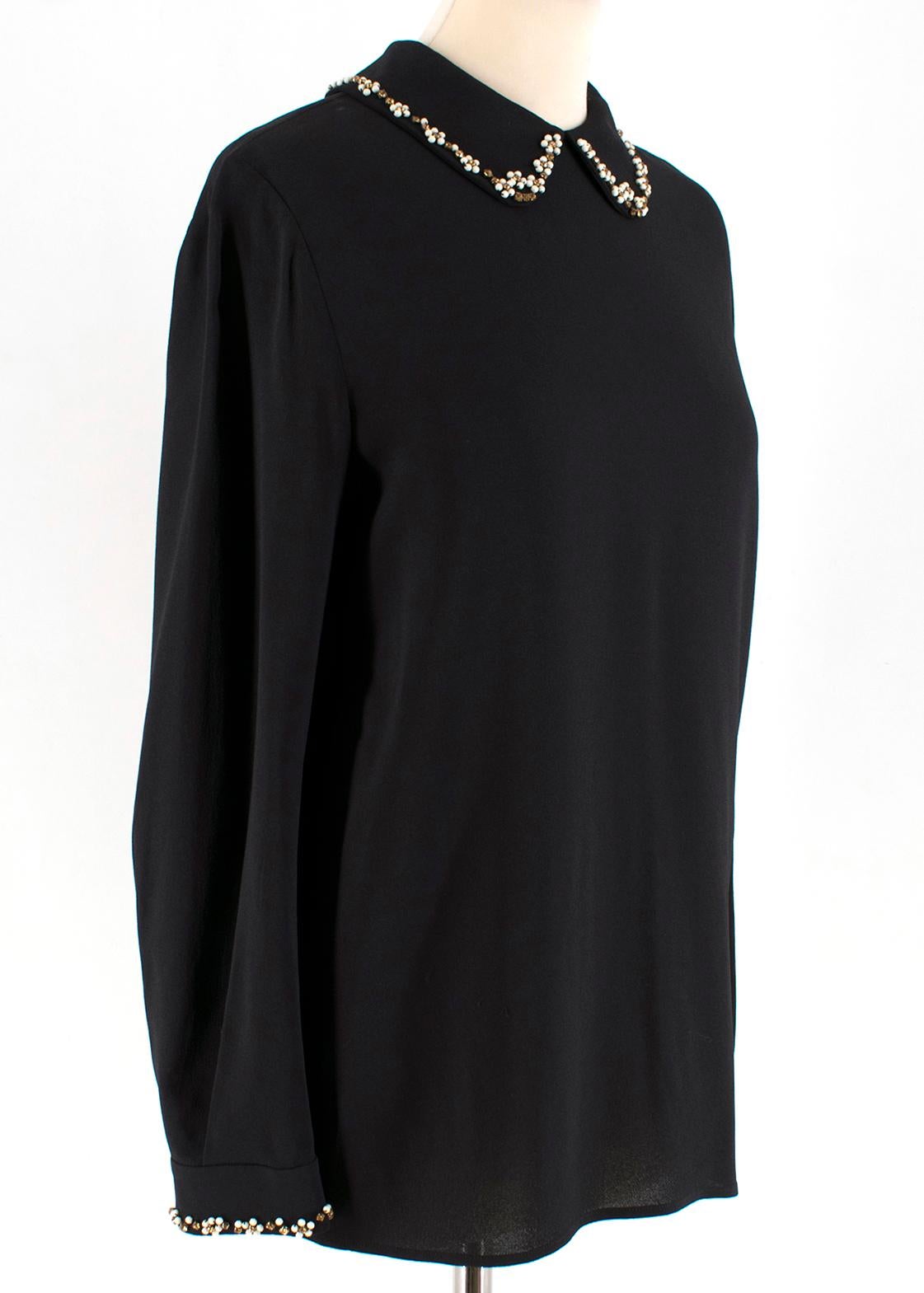 Miu Miu Black Crepe Collar Embellished Shirt

- black crepe shirt
- bead embellished collar and sleeve trim in floral motive
- lonhsleeve
- button fastening to the back
- lightweight 

The seller usually wears XS size.

Please note, these items are