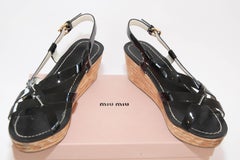 MIU MIU Black Criss Cross Patent Leather Sling Back Wooden Wedges Sandals