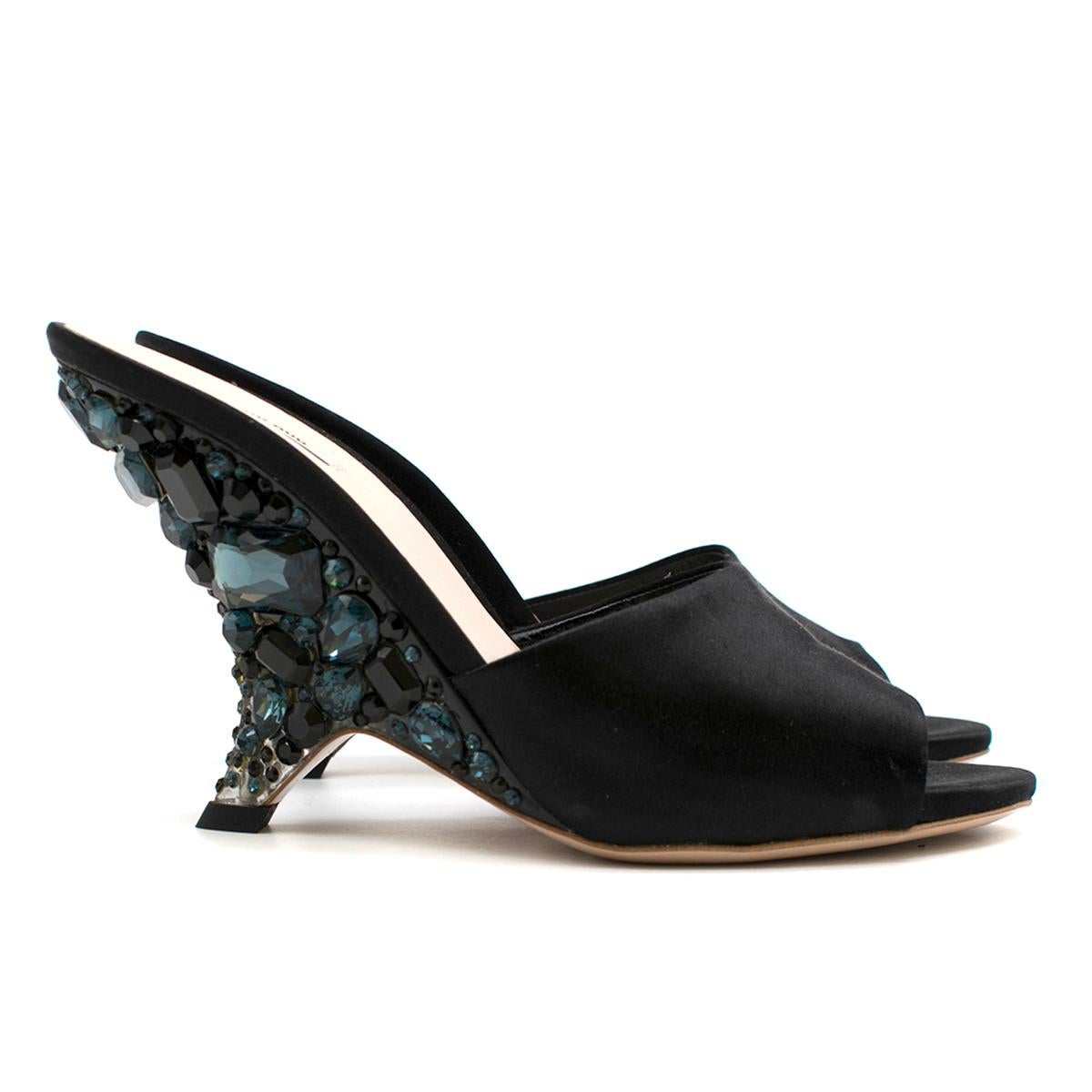 Miu Miu Black Crystal Embellished Wedge Mules 

- Black Mule Heels 
- Curved perspex heels embellished with blue crystals
- Black satin front strap 
- Peep toe, slim toeline 
- Beige leather insole and outsole

This item comes with an additional