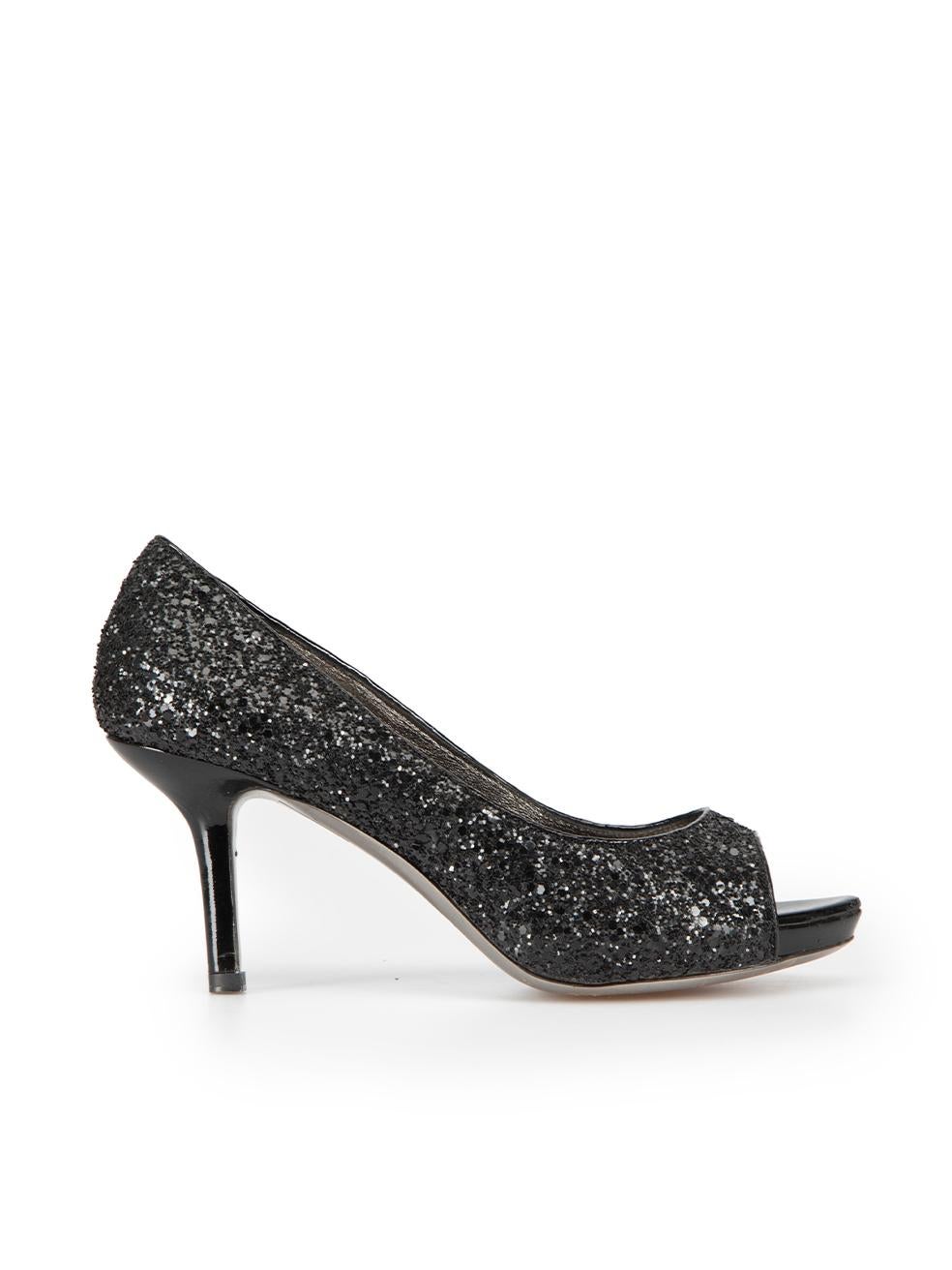 CONDITION is Very good. Minimal wear to shoes is evident. Minimal wear to the right-shoe heel-stem underside with small scuff on this used Miu Miu designer resale item. These shoes come with original dust bags.
 

 

 

 Details
 

 

 Black
 

