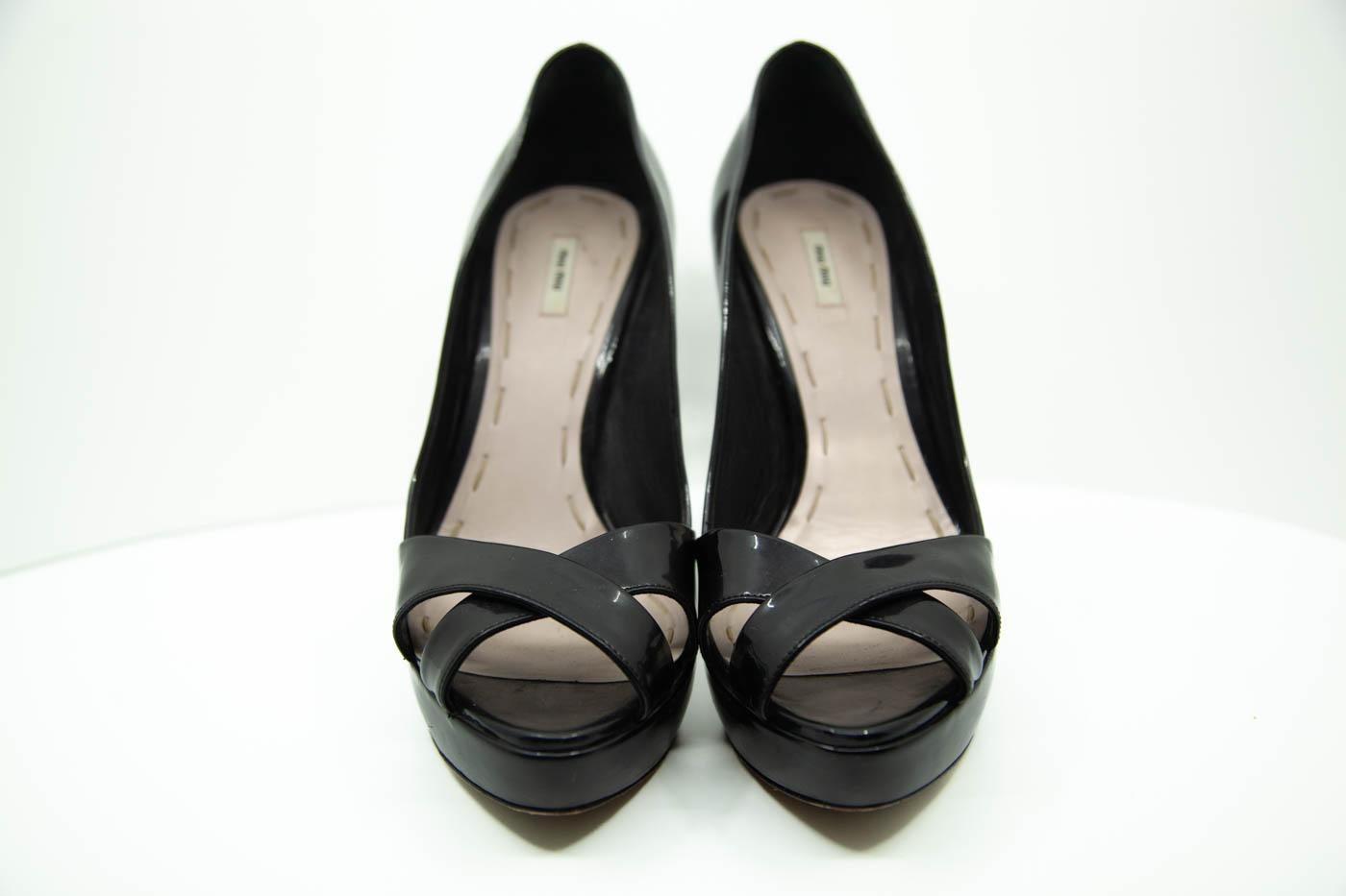 Miu Miu black crossed open toed heels 
 size EU 38 1/2
U.S- 7 1/2