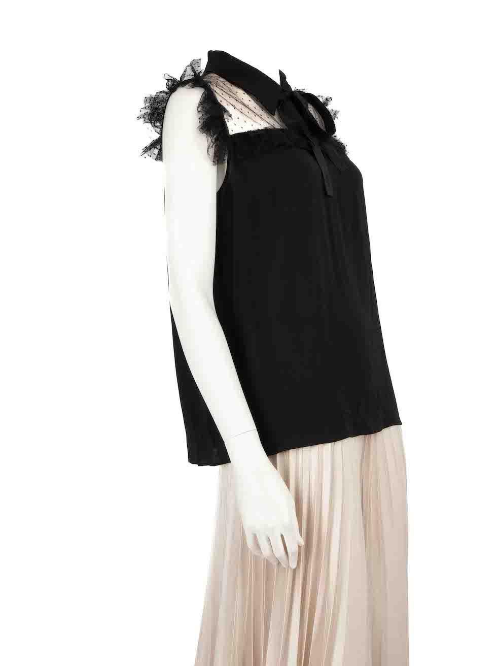 CONDITION is Very good. Hardly any visible wear to top is evident on this used Miu Miu designer resale item.
 
 
 
 Details
 
 
 Black
 
 Viscose
 
 Top
 
 Sleeveless
 
 Sheer lace top panel
 
 Ruffle trim
 
 Neck tie strap
 
 Back button fastening
