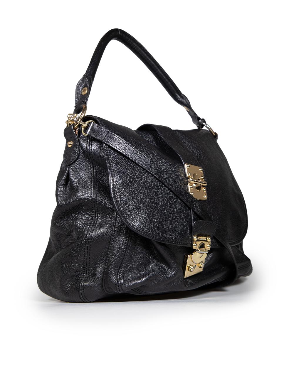 CONDITION is Very good. Minimal wear to bag is evident. There are indents and scratches to the hardware especially across the lock on this used Miu Miu designer resale item.
 Details
 Black
 Leather
 Shoulder bag
 1x Top handle
 1x Detachable strap

