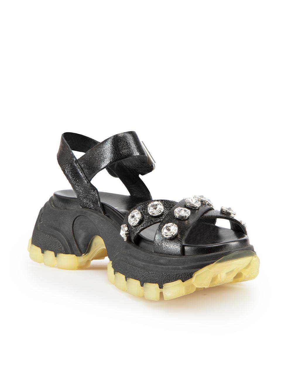 CONDITION is Never worn. No visible wear to sandals is evident on this new Miu Miu designer resale item. These shoes come with original dust bag.

Details
Black
Leather
Sandals
Chunky platform
Open toe
Crystal embellished
Adjustable ankle