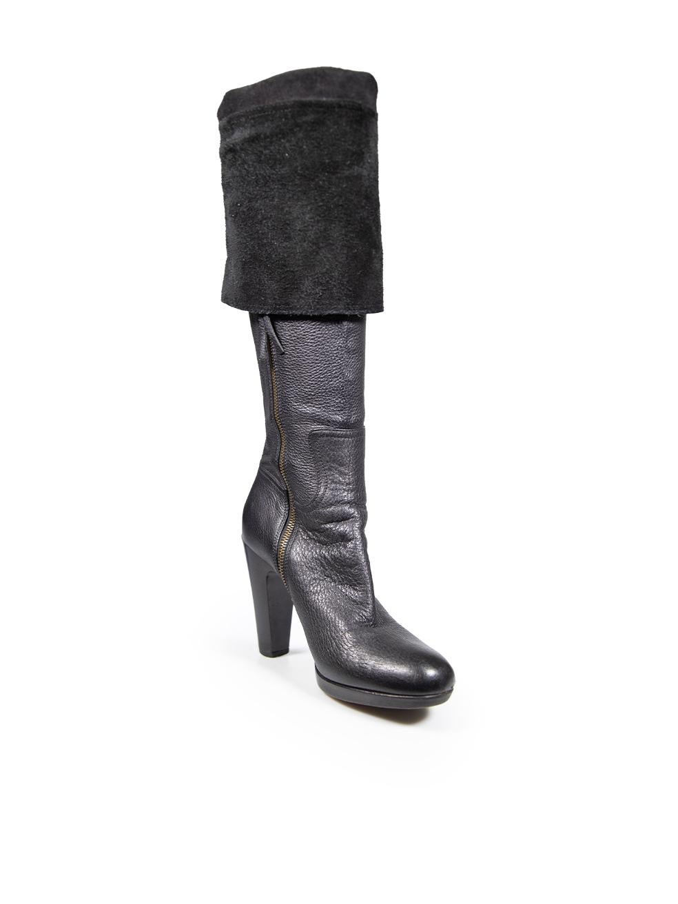 CONDITION is Good. Minor wear to the boots is evident. Abrasion on the platform, toe box, counter and heel to both shoes. General creasing to the leather across the vamp. General wear across the suede on the upper half of both shoes. Deterioration