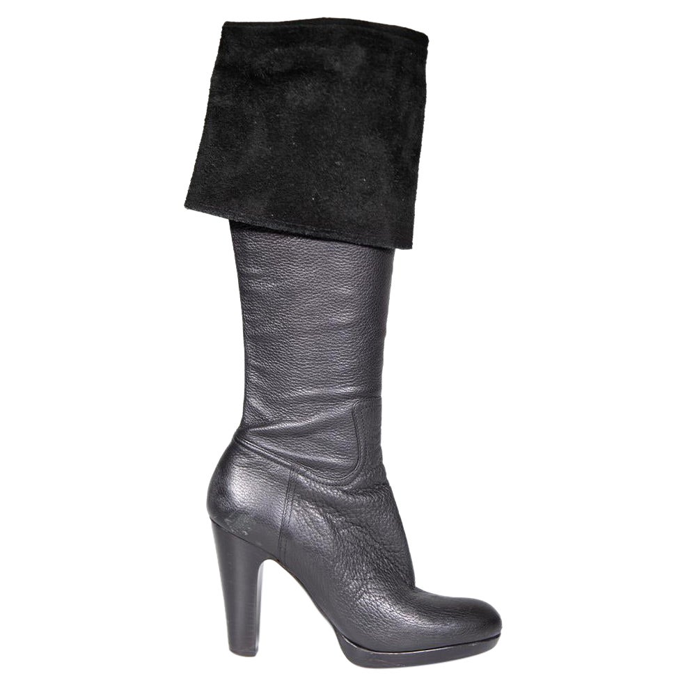 Miu Miu Stivali con tacco in pelle nera taglia IT 38