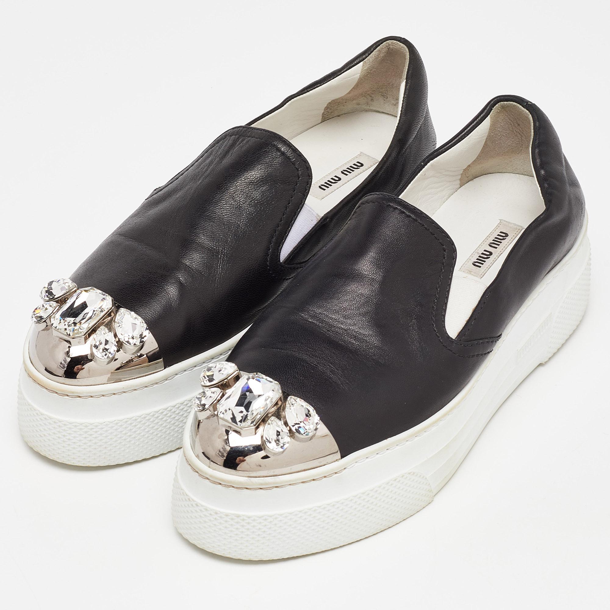 Elevate your footwear game with these Miu Miu sneakers. Combining high-end aesthetics and unmatched comfort, these sneakers are a symbol of modern luxury and impeccable taste.