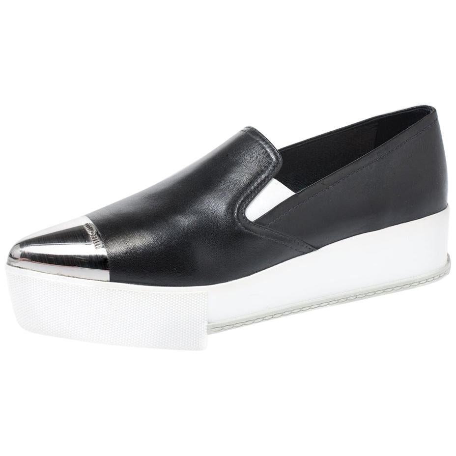 Miu Miu Black Leather Metal Cap Toe Platform Slip On Sneakers Size 39 For  Sale at 1stDibs | miu miu cap toe sneakers, miu miu platform sneakers, miu  miu cap toe platform sneakers