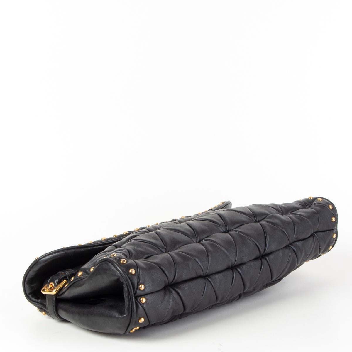 MIU MIU black leather STUDDED MATELASSE QUILTED Clutch Bag In Good Condition For Sale In Zürich, CH