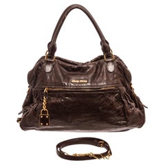 Miu Miu Black Leather Two Way Bag Sac à bandoulière avec matière cuir