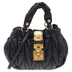 Miu Schwarze Bauletto Aperto Umhängetasche aus Matelas Leder