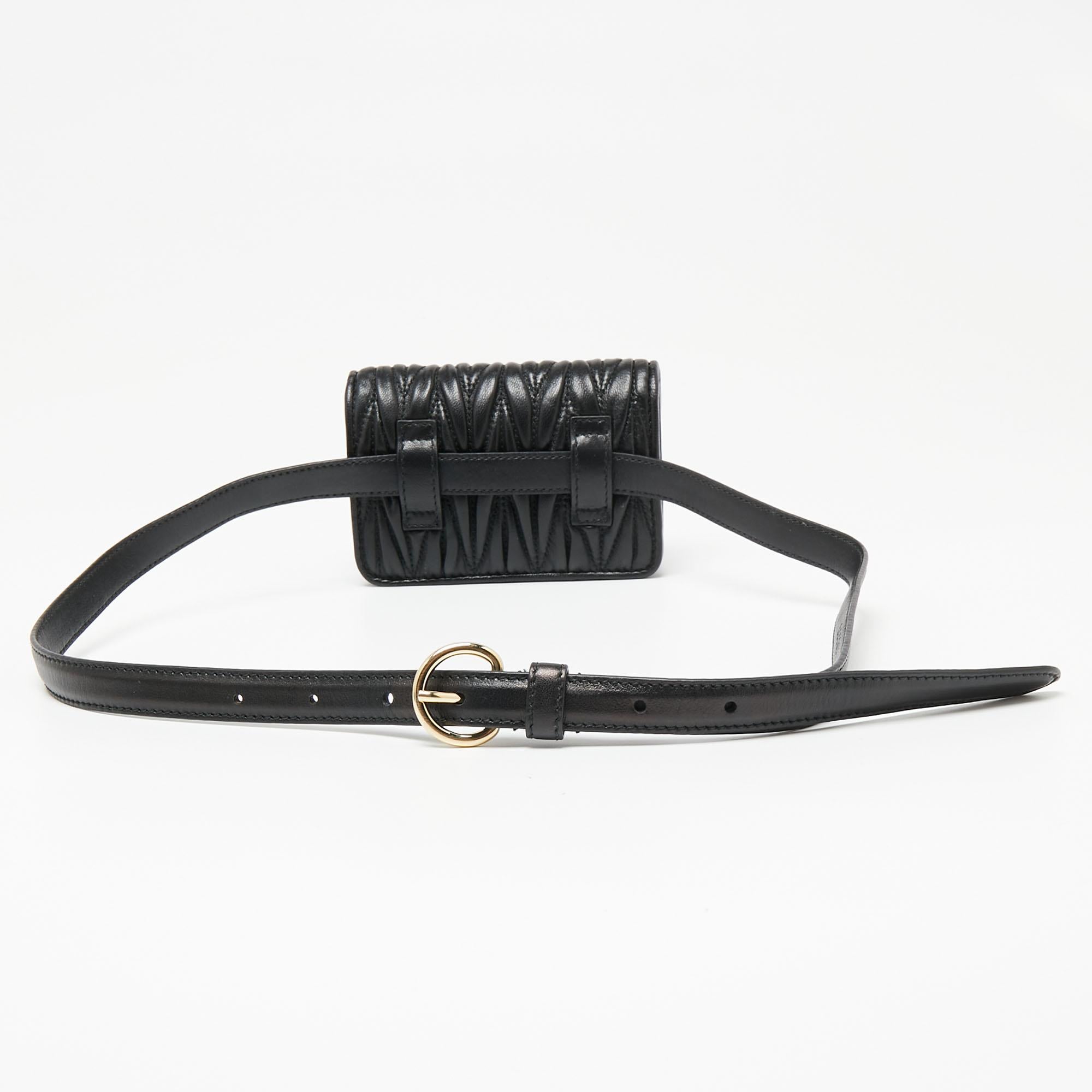 This belt bag from Miu Miu is indeed functional yet fashionable. It is crafted from black leather and displays the logo on the front in a gold tone. It is completed with a front flap that reveals a well-sized interior. Wear it over jumpsuits for an