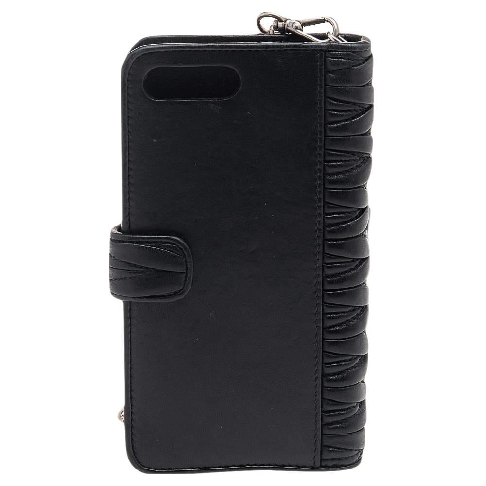 Here's a cute and chic way to carry your iPhone 8 plus. From the House of Miu Miu comes this beautiful phone case that will keep your device stylishly and safely all day! It is made from black Matelasse leather, augmented with a crystal-embellished