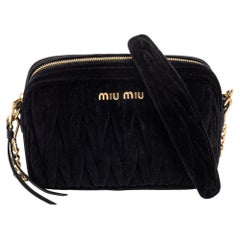 Miu - Sac à bandoulière en velours matelassé noir