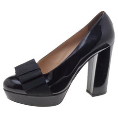 Miu Miu Bombas de plataforma con lazo de charol negro Talla 35.5