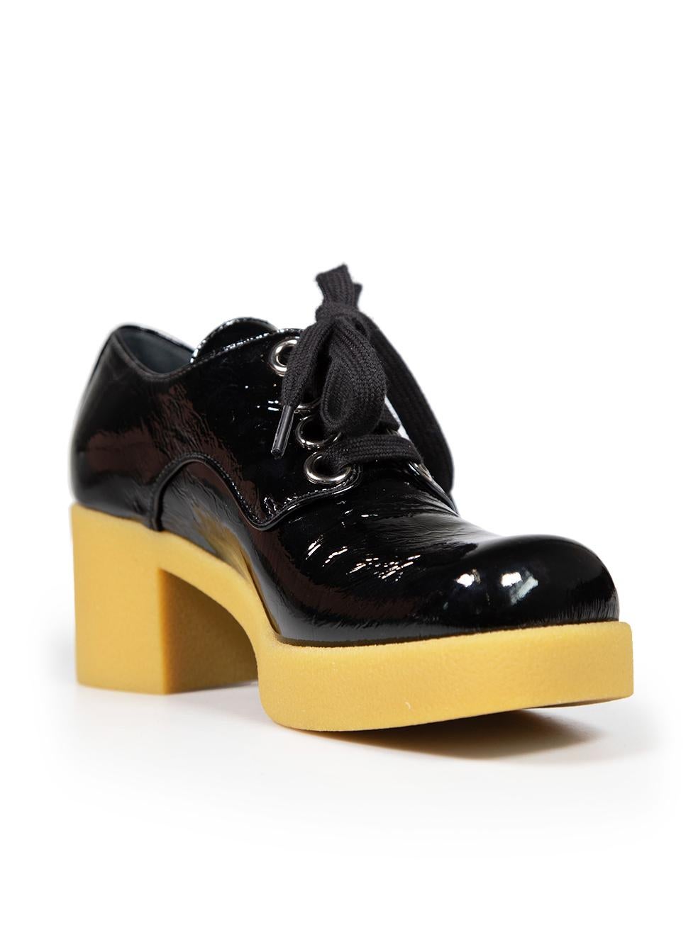 CONDITION is Very good. Minimal wear to the shoes is evident. Minimal wear to the front is seen with creasing to the leather on this used Miu Miu designer resale item. This item comes with an original box.
 
 
 
 Details
 
 
 Black
 
 Patent