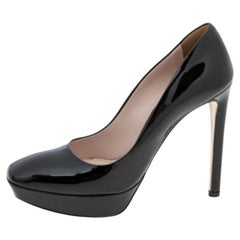 Miu Miu Bombas de plataforma de charol negro talla 37