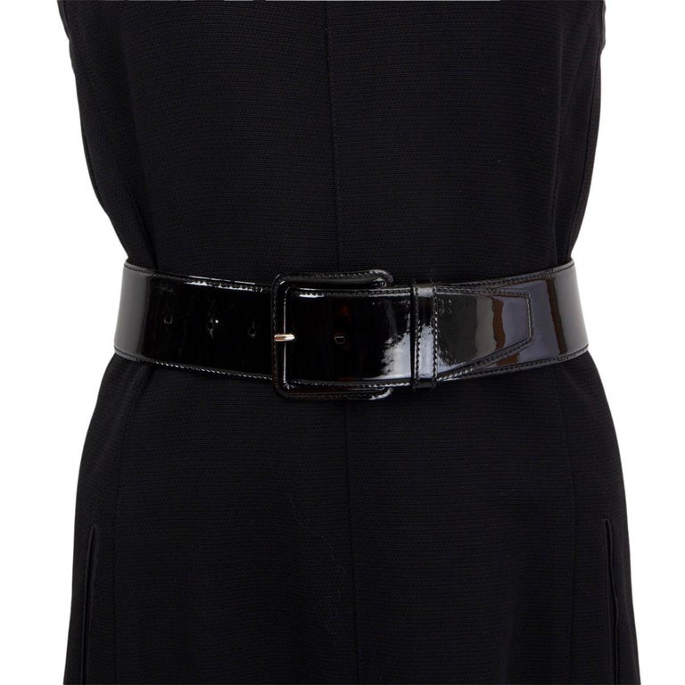 100% authentic Miu Miu waist belt in black patent leather and square buckle. Has been worn and is in excellent condition. Comes with dust bag. 

Measurements
Tag Size	70
Width	5cm (2in)
Fits	59cm (23in) to 69cm (26.9in)
Length	86cm (33.5in)
Buckle