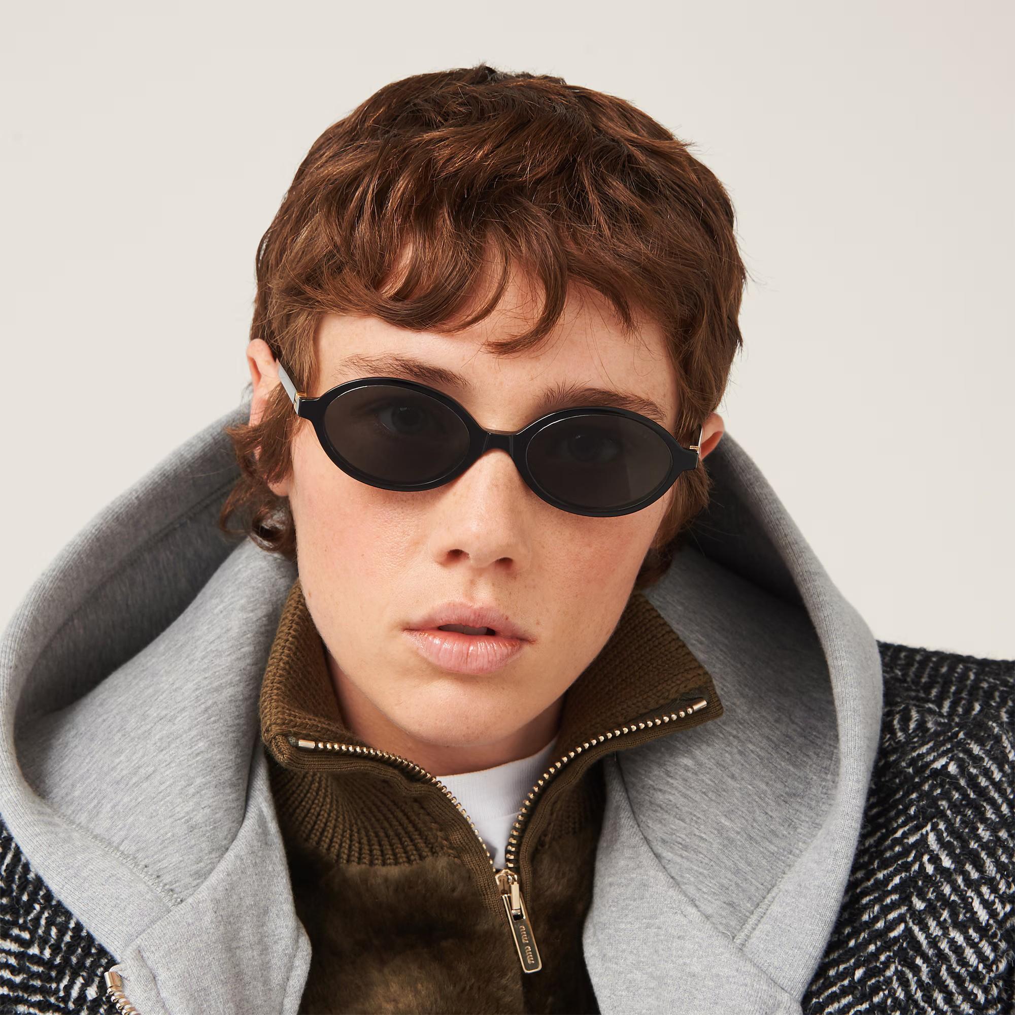 Women's MIU MIU black REGARD OVAL Sunglasses SMU04Z-F For Sale