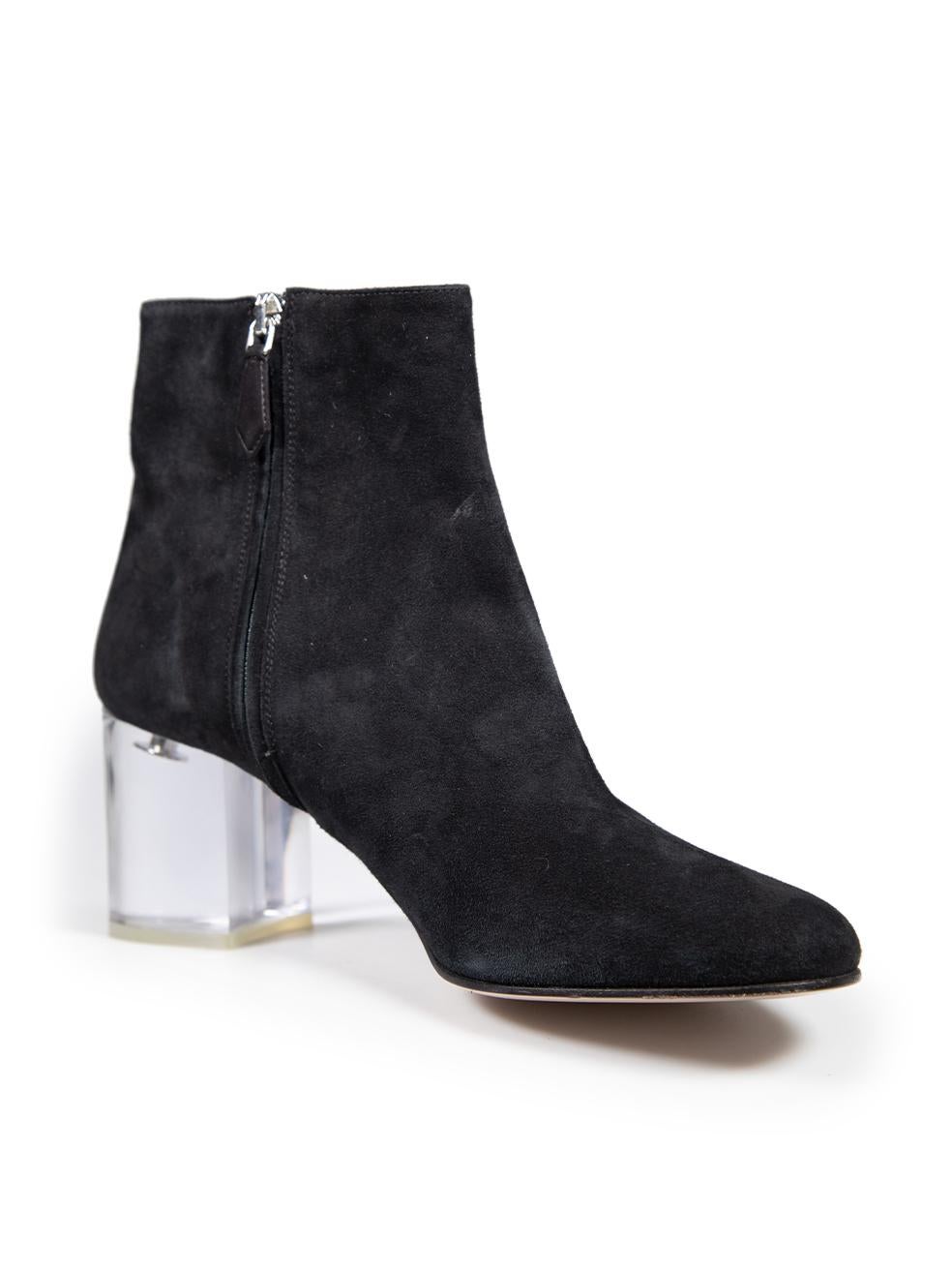 CONDITION is Very good. Minimal wear to the boots is evident. Abrasion on both heels, left counter, upper of the left shoe and the right side of the right shoe on this used Miu Miu designer resale item. This pair of shoes comes in the original dust
