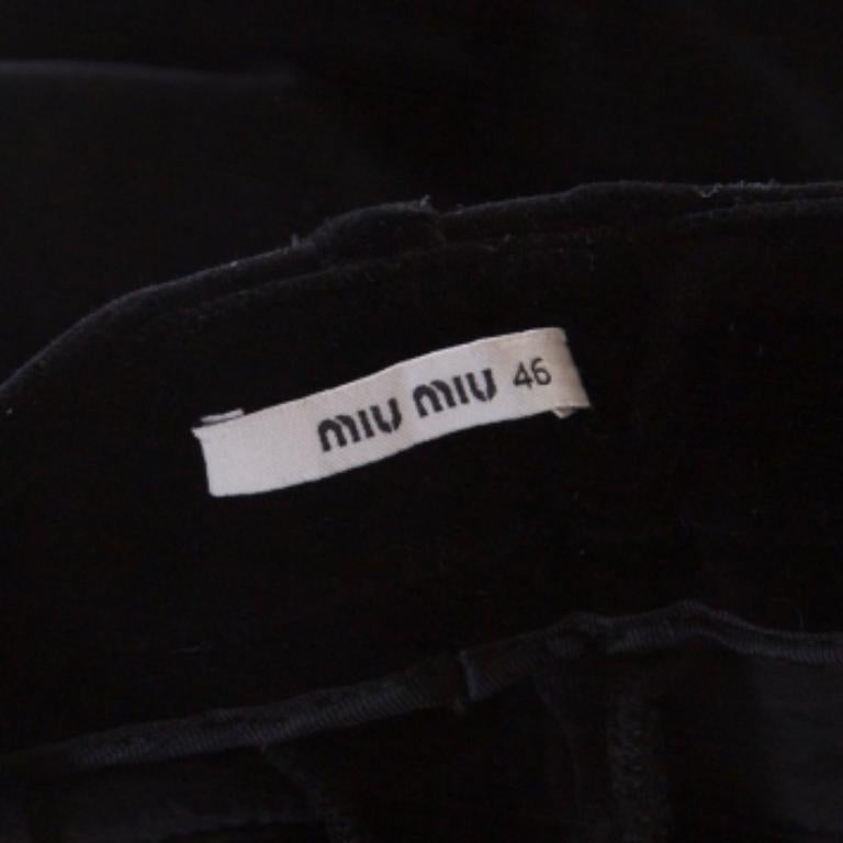 Donna Pantaloni Miu Miu in velluto nero elasticizzato con dettaglio zip alla caviglia L.L.A. in vendita