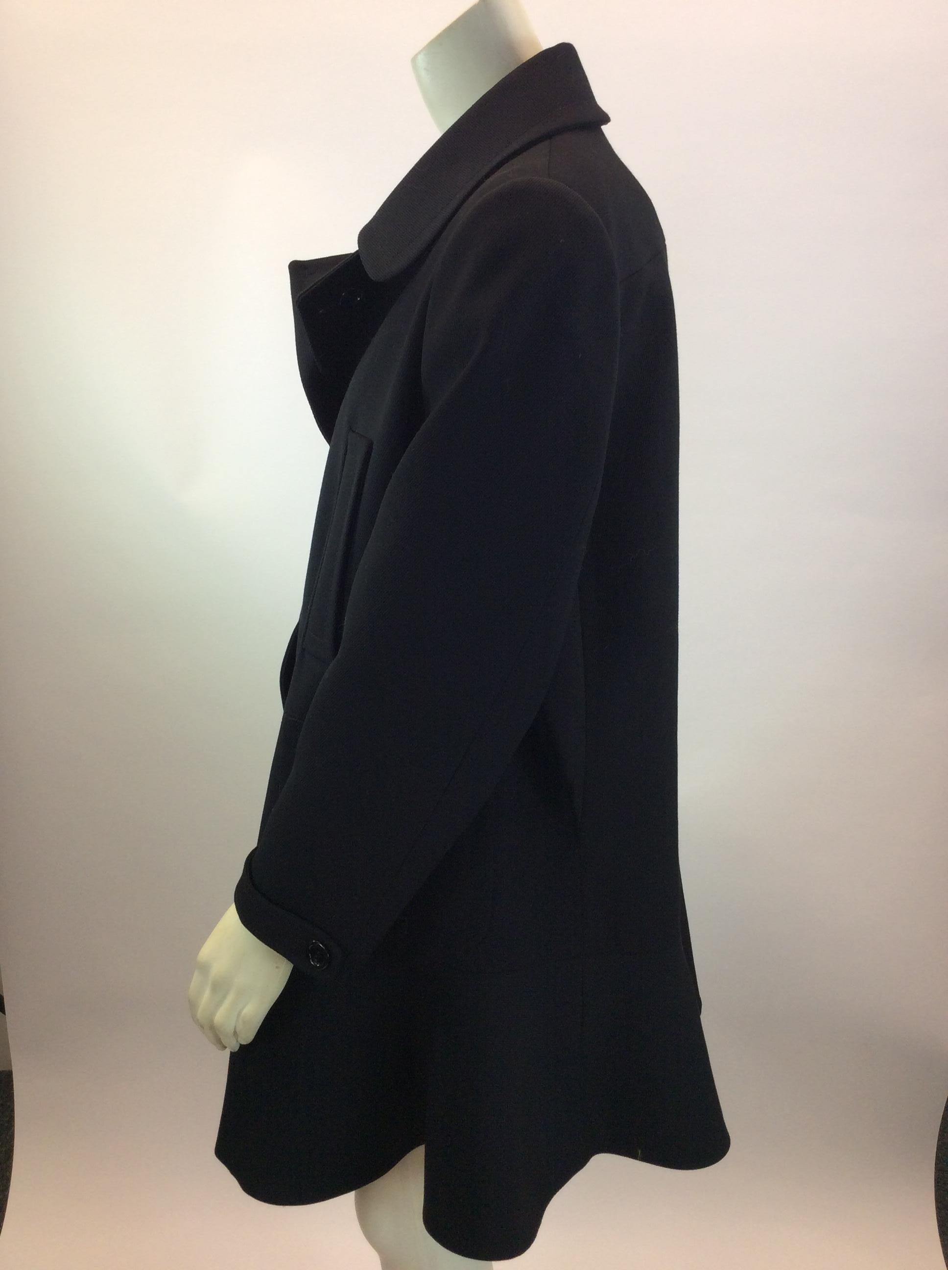 Miu Miu Black Wool Coat
$899
Made in Italy
100% Wool
Size 48
Length 33”
Bust 49”
Waist 47”