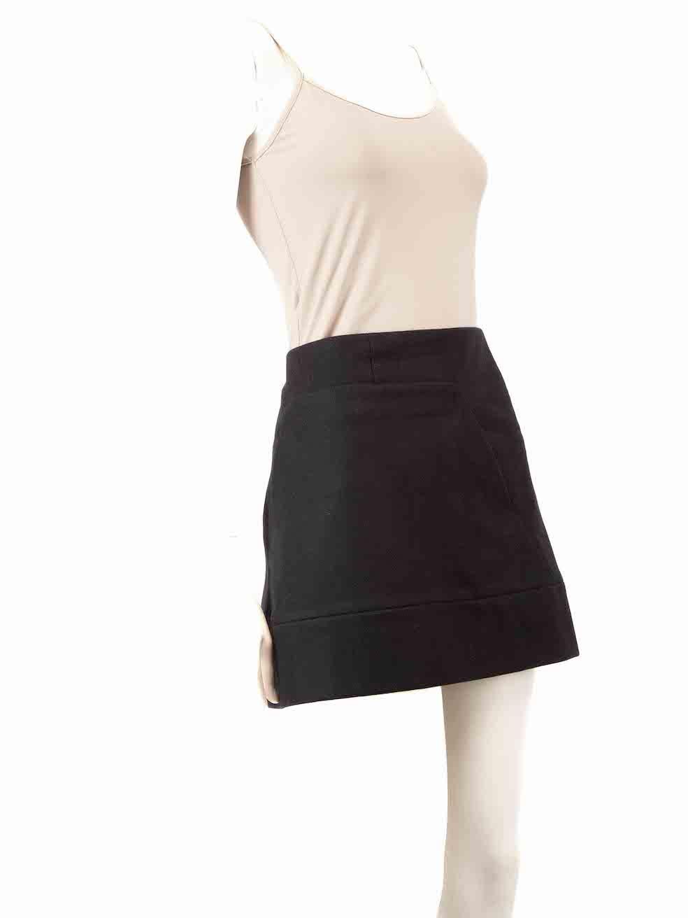 CONDITION is Very good. Hardly any visible wear to skirt is evident on this used Miu Miu designer resale item.
 
 
 
 Details
 
 
 Black
 
 Wool
 
 Skirt
 
 Mini
 
 A-Line
 
 2x Front pockets
 
 Back zip fastening
 
 
 
 
 
 Made in Italy
 
 
 
