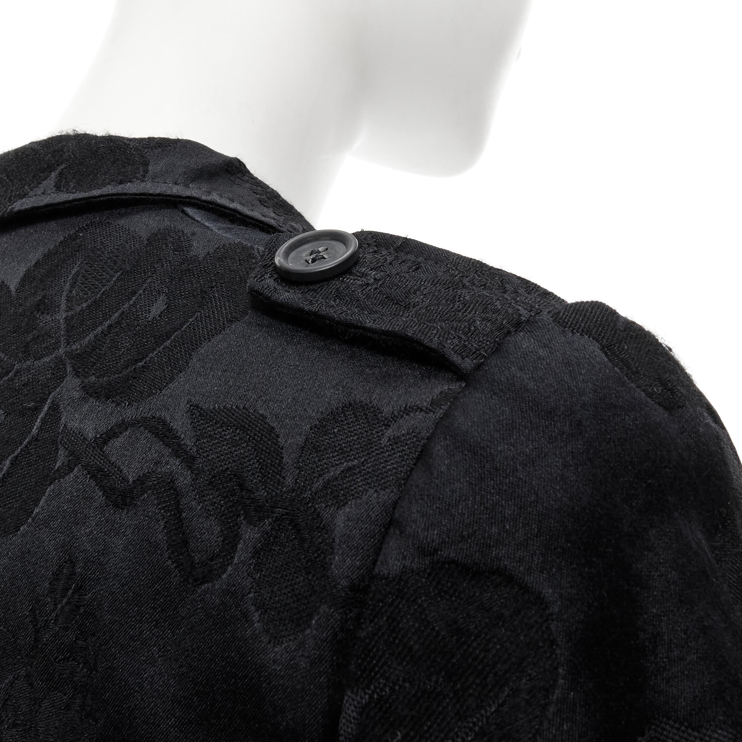MIU MIU black wool sil floral jacquard cropped military jacket IT40 S 
Reference: CELG/A00066 
Brand: Miu Miu 
Designer: Miuccia Prada 
Material: Wool 
Color: Black 
Pattern: Floral 
Closure: Button 
Extra Detail: Flap pocket detail. Shoulder
