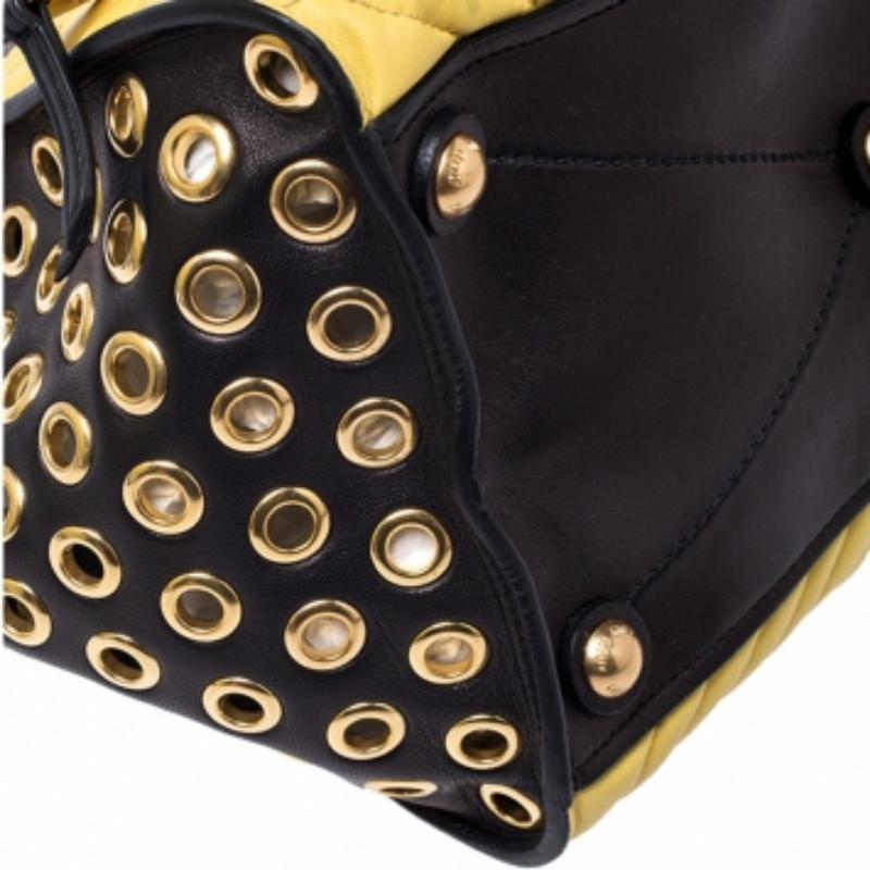 Miu Miu Black/Yellow Leather Grommet Biker Convertible Tote Bon état - En vente à Dubai, Al Qouz 2